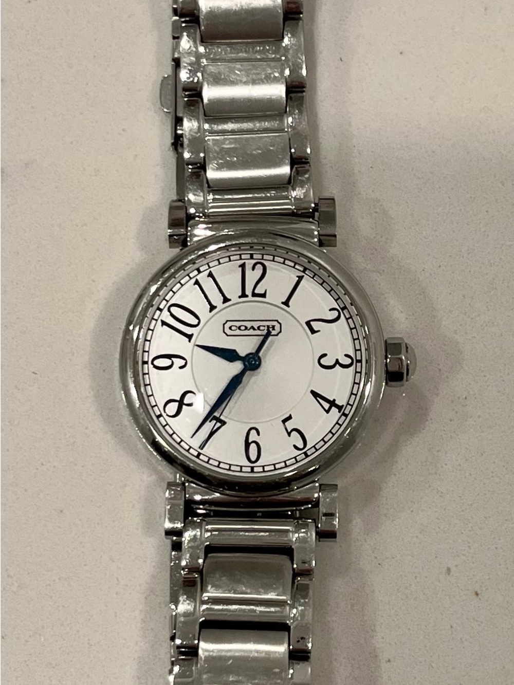 Coach Women's Silver Bracelet Watch with White Dial and Blue Hands